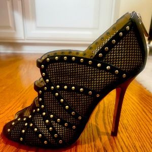 Black Jimmy Choo Heels with silver hardware, mesh inset.